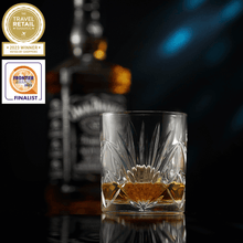 The Connoisseur's Set - Palm Glass Edition showcasing a crystal whiskey glass with amber whiskey, perfect for cocktails and gifts.
