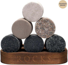 Set of whiskey chilling stones in a wooden holder, perfect for barware and gifting whiskey lovers.