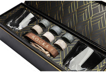 The Connoisseur's Set featuring whiskey chilling stones and twist crystal glasses in elegant packaging.