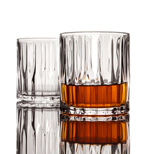 The Cocktail Smoker Kit includes elegant glasses for enjoying whiskey from a whiskey smoking set.