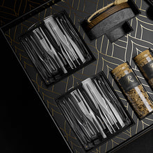 The Cocktail Smoker Kit components, including utensils and wood chips, perfect for a whiskey smoking set.