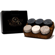 Set of unique granite whiskey chilling stones in a wooden holder, perfect for barware and gifts.