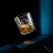 Soleil Glass Edition whiskey glass showcasing bourbon, highlighting craftsmanship and elegance in barware.