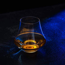 Elegant whiskey nosing glass showcasing amber whiskey, ideal for connoisseurs and perfect for gifts or barware.