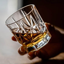 Elegant Imperial Eco Crystal whiskey glass filled with whiskey, perfect for sipping and enjoying rich flavors.