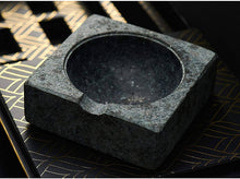 Handcrafted granite cigar ashtray on elegant barware design, ideal for whiskey lovers and sophisticated gift sets.