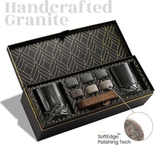 The Connoisseur's Set featuring whiskey glasses, granite chilling stones, and elegant packaging for the perfect gift.