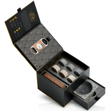 The Gentleman's Set with whiskey chilling stones, cigar cutter, ashtray, and whiskey stones in elegant packaging.