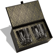 Luxurious whiskey glass gift set with elegant packaging, perfect for barware and special occasions.