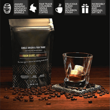 Gourmet Bourbon Barrel Aged Coffee with whiskey glass, coffee beans, perfect for gifts and barware.