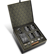 Elegant whiskey decanter gift set with glasses and chilling stones in a stylish box, perfect for barware enthusiasts.
